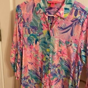 It’s a cover up or a dress with belt small good condition